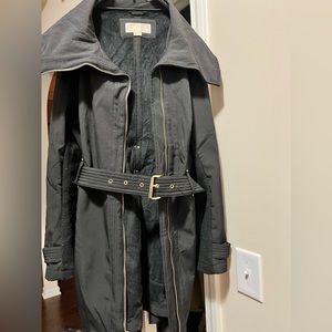 Black Michael Kors Coat with gold hardware and belt. Great condition